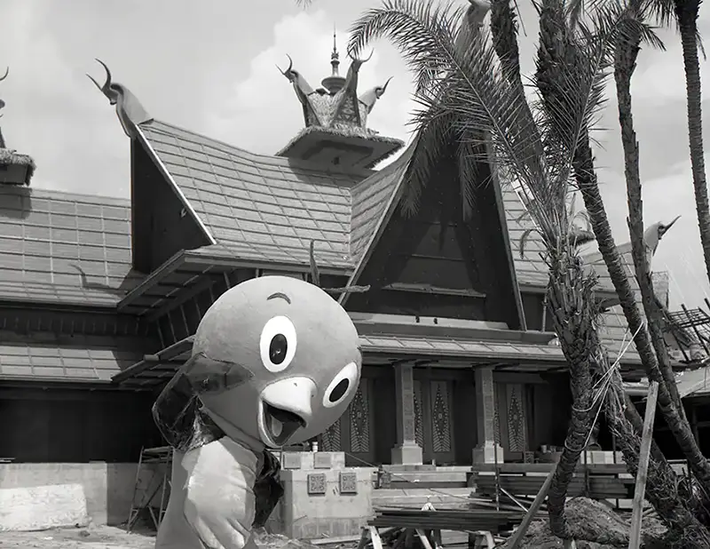 Disney Orange Bird in front of Tropical Serenade, now known as the Tiki Room, at Magic Kingdom