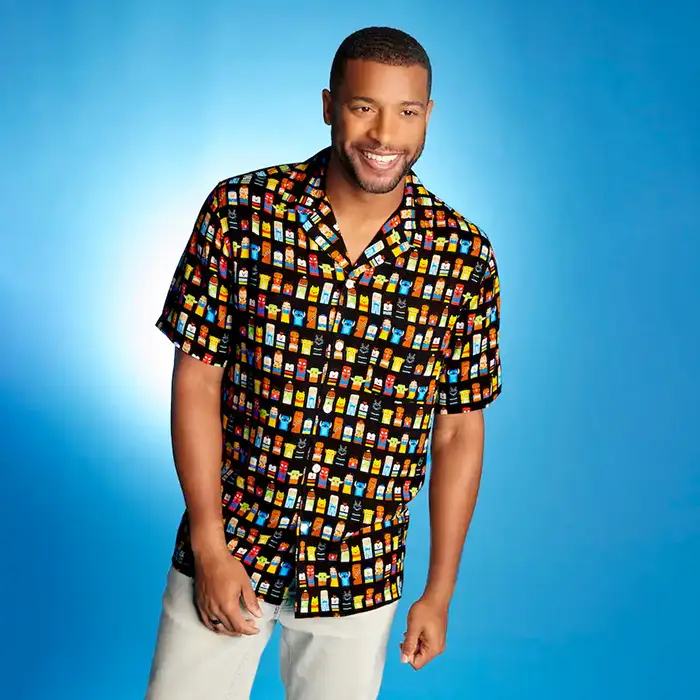 Man wearing Disney100 Unified Character Collection woven shirt
