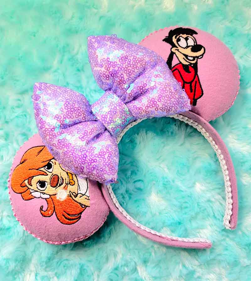 A Goofy Movie mouse ears headband featuring Max and Roxanne embroidered on the ears