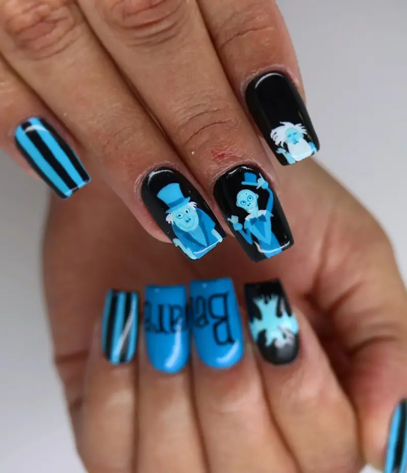 Haunted Mansion nails featuring the hitchhiking ghosts.
