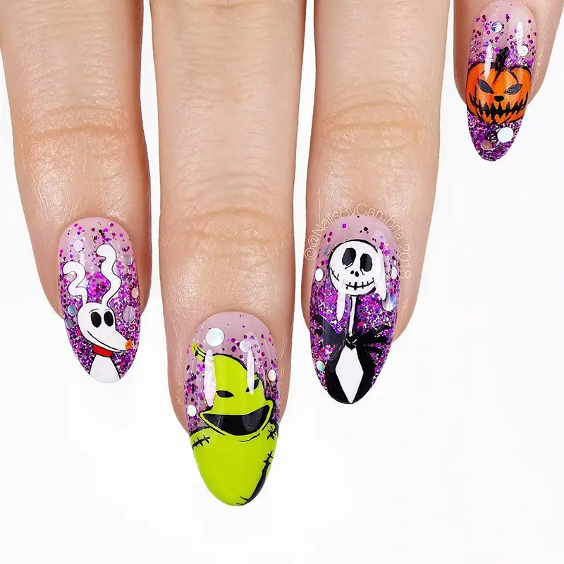 Nightmare Before Christmas nails for Halloween featuring Jack, Zero, and Oogie Boogie.