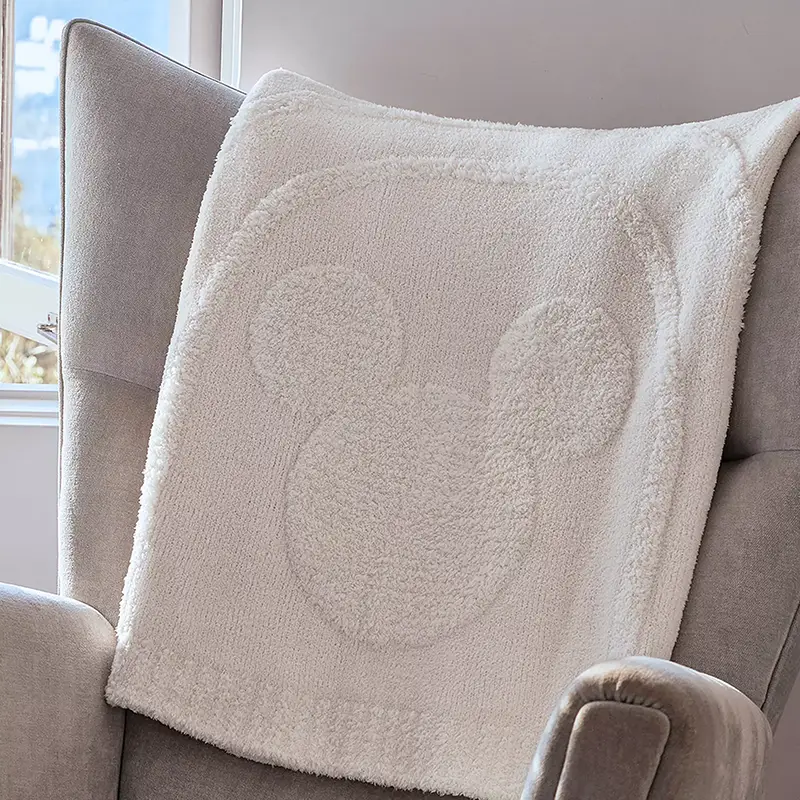 Barefoot Dreams Disney blanket with Mickey icon