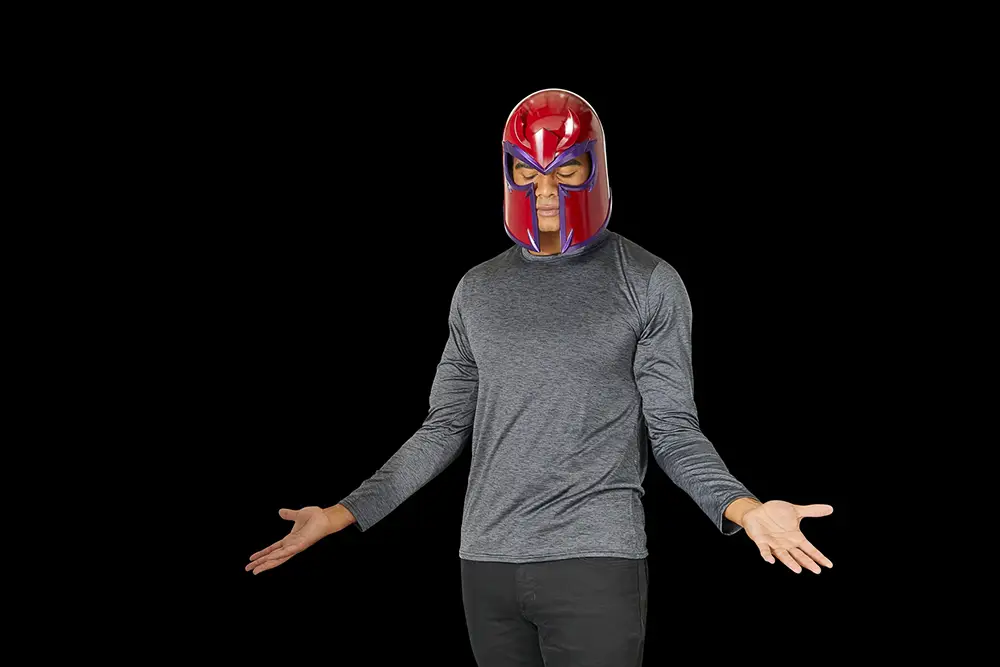 Marvel Legends X-Men '97 Magneto Helmet being worn by man doing superhero pose