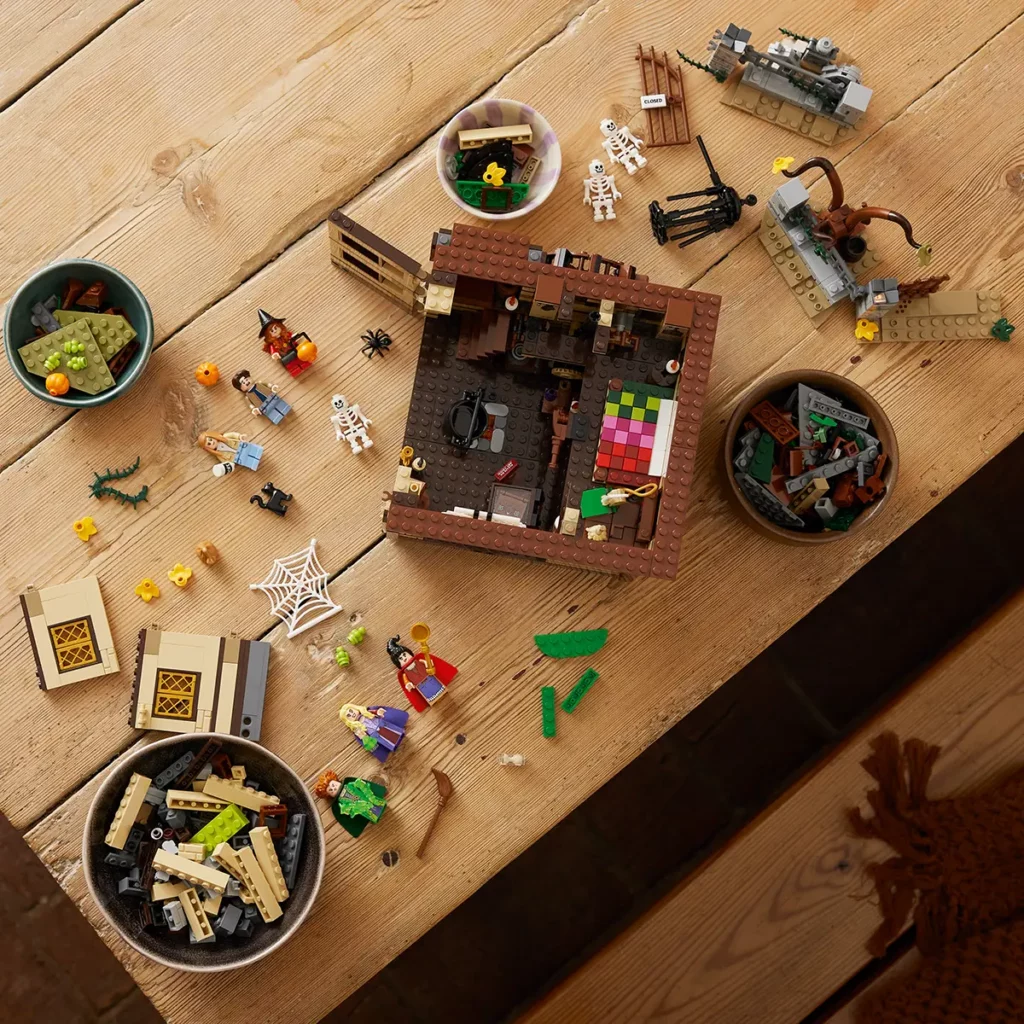 Pieces from the LEGO Ideas Disney Hocus Pocus: The Sanderson Sisters’ Cottage set.