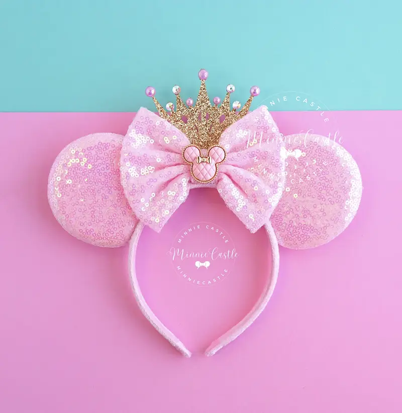 Pink princess Minnie ears with a tiara.