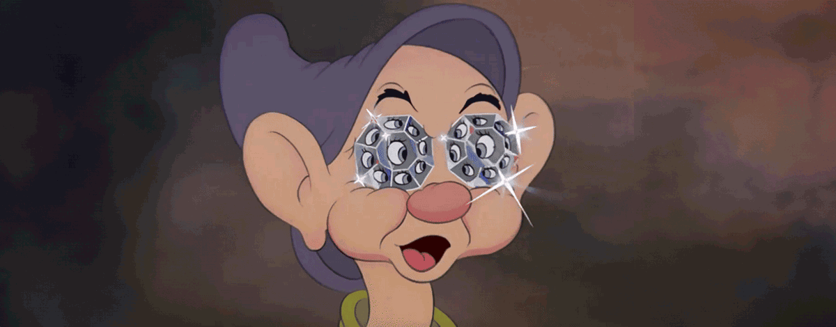 Snow White's Dopey with diamond eyes and is wiggling his ears