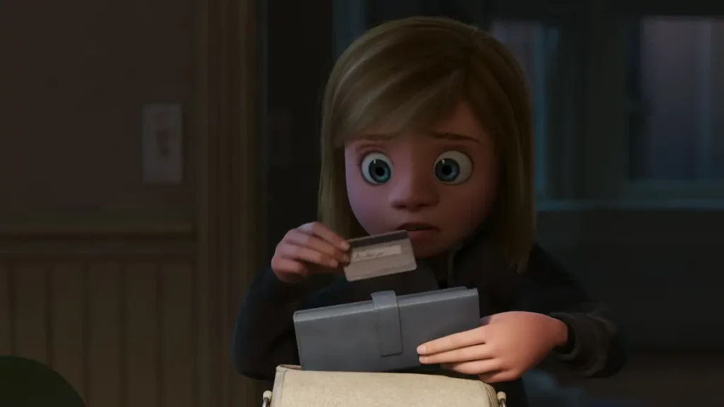 Riley stealing her mom's credit card in Inside Out