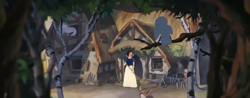 Snow White in front of the Seven Dwarfs cottage